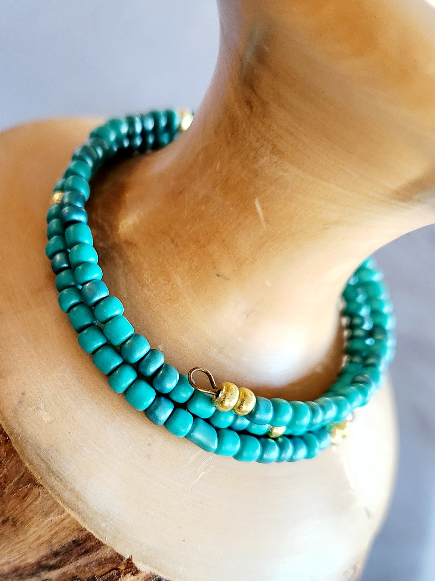 Bangle bracelet. Memory wire, beaded. Add-on charms available.