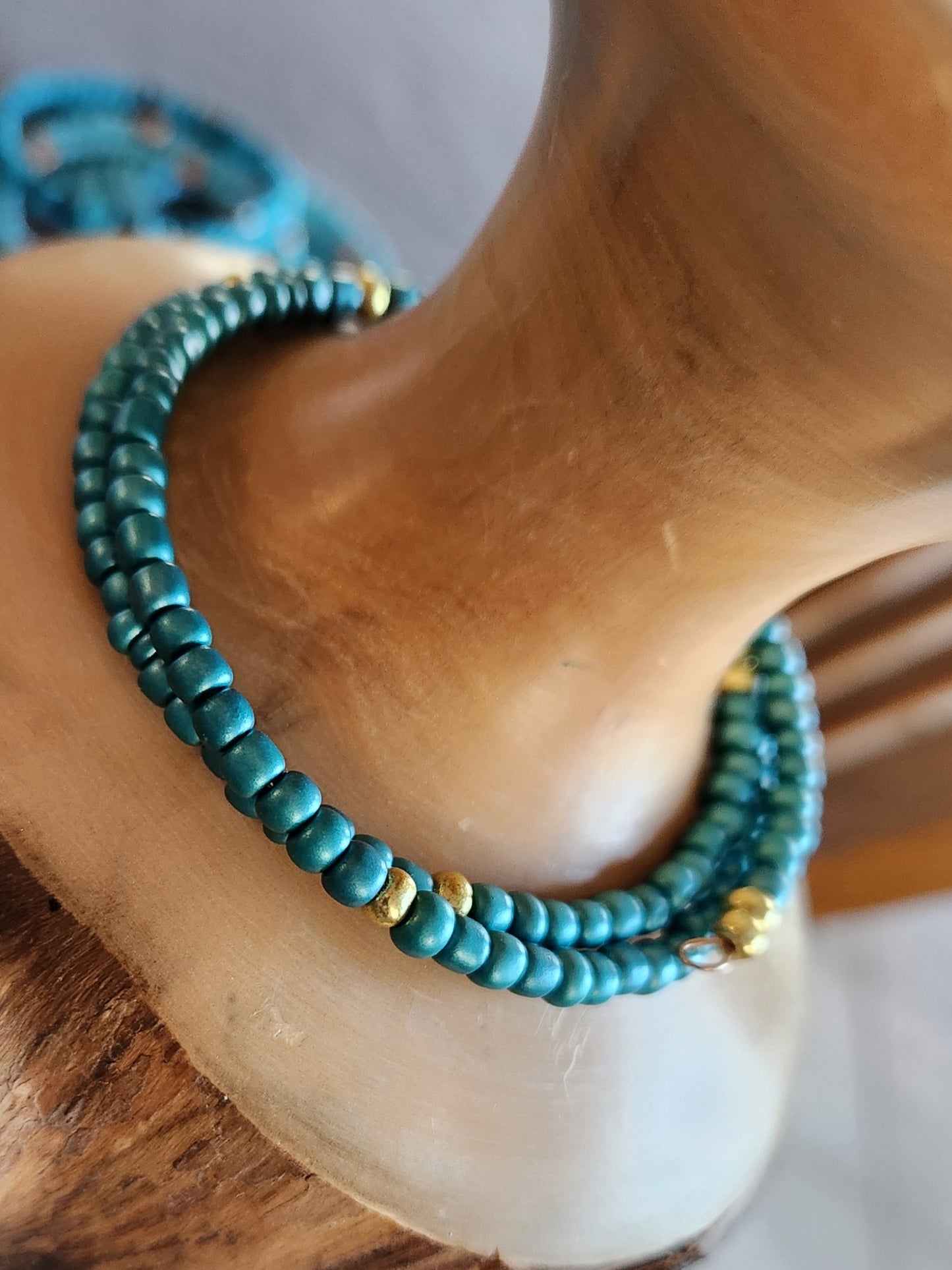 Bangle bracelet. Memory wire, beaded. Add-on charms available.