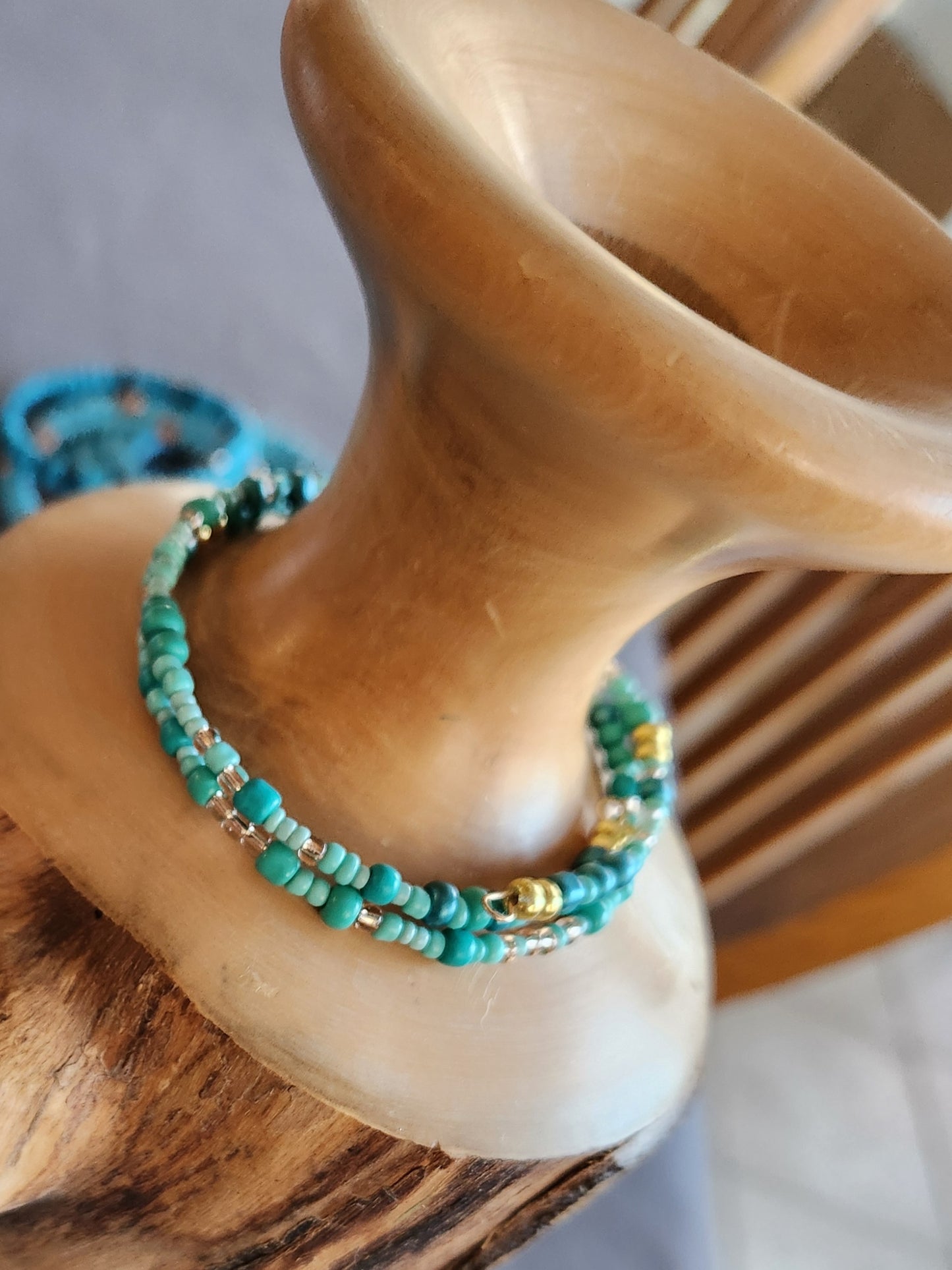 Bangle bracelet. Memory wire, beaded. Add-on charms available.