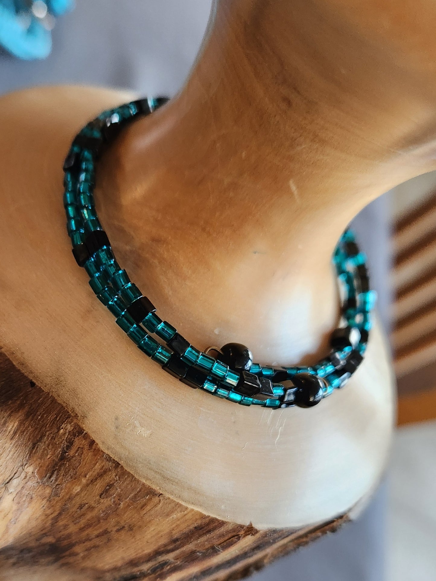 Bangle bracelet. Memory wire, beaded. Add-on charms available.