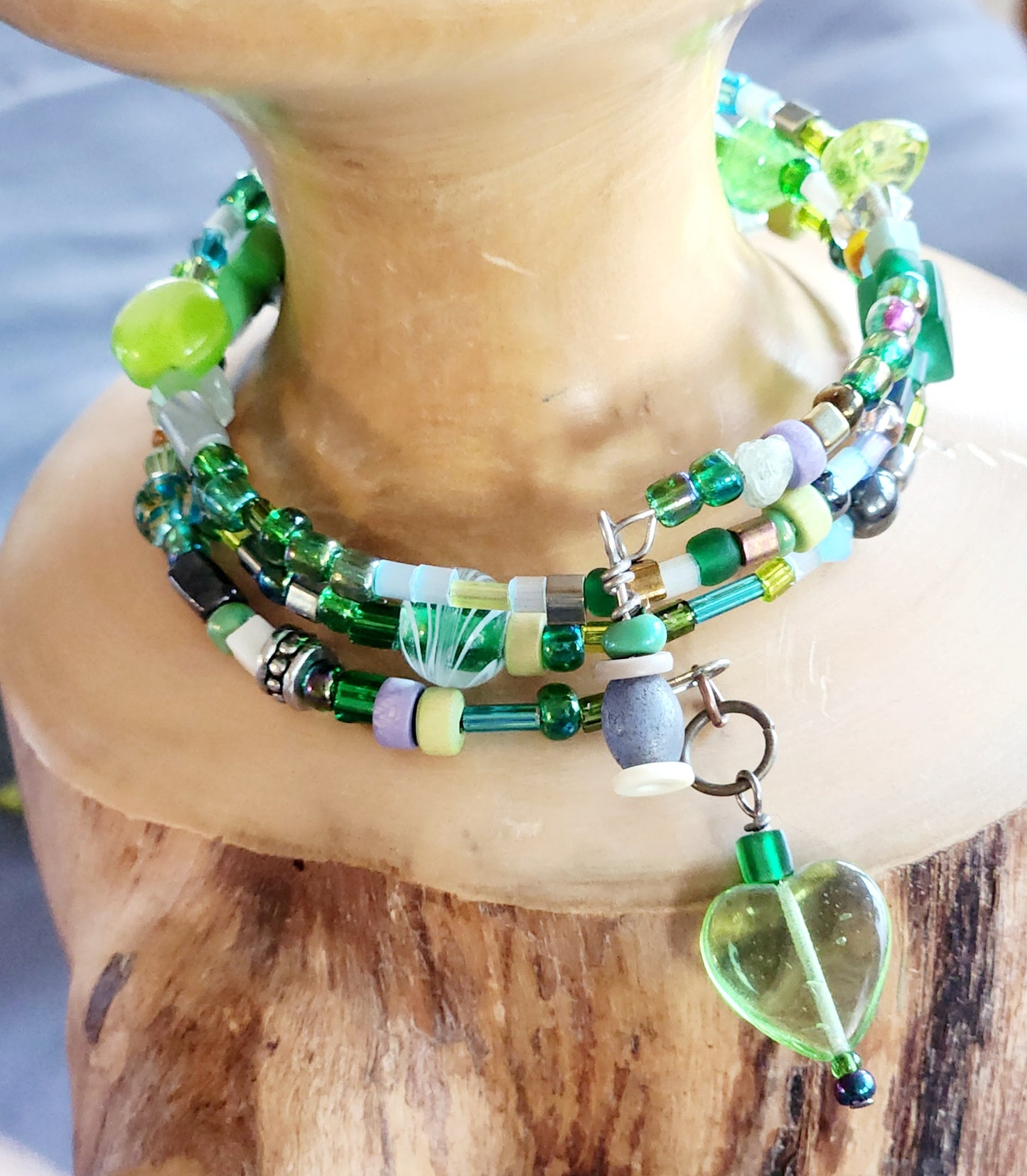 Bangle bracelet. Memory wire, beaded. Add-on charms available.