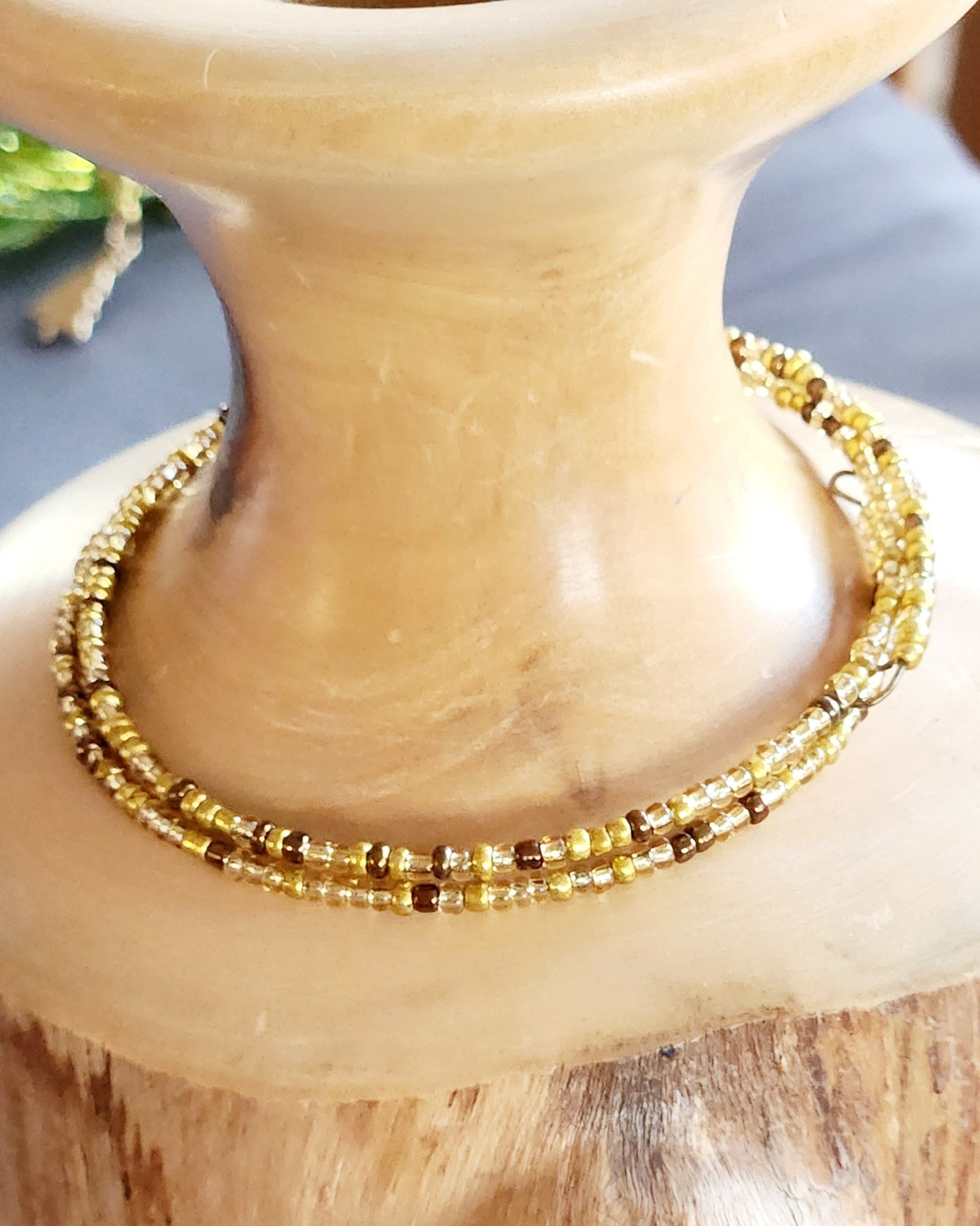 Bangle bracelet. Memory wire, beaded. Add-on charms available.