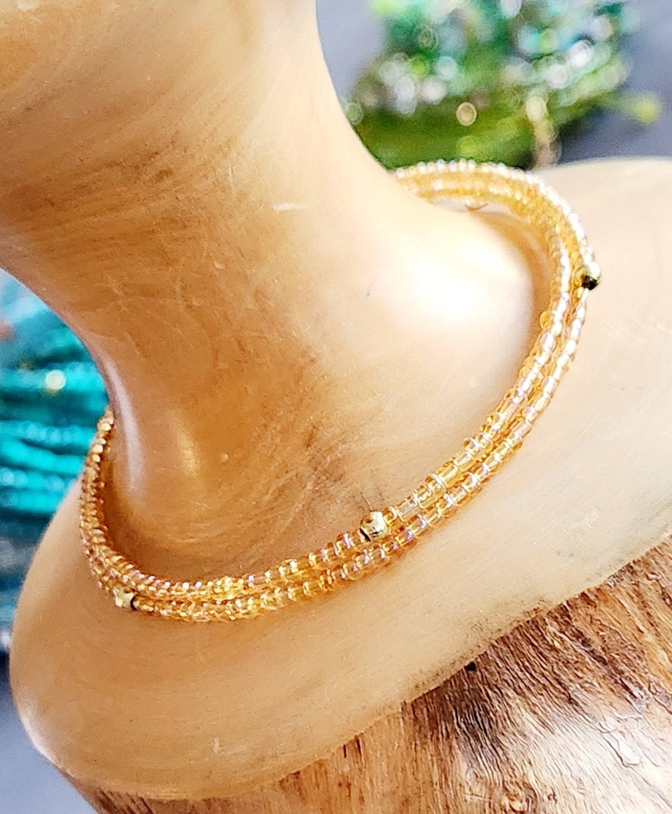 Bangle bracelet. Memory wire, beaded. Add-on charms available.