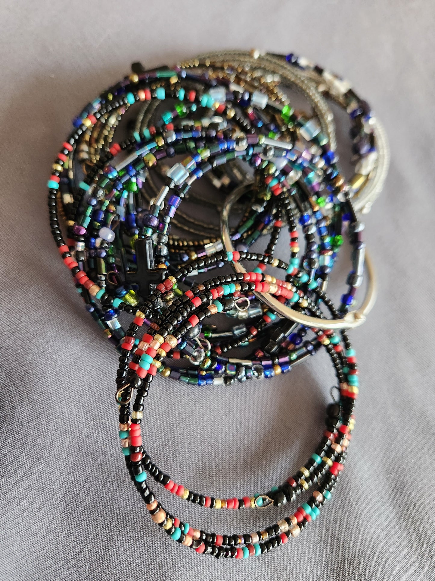 Bangle bracelet. Memory wire, beaded. Add-on charms available.