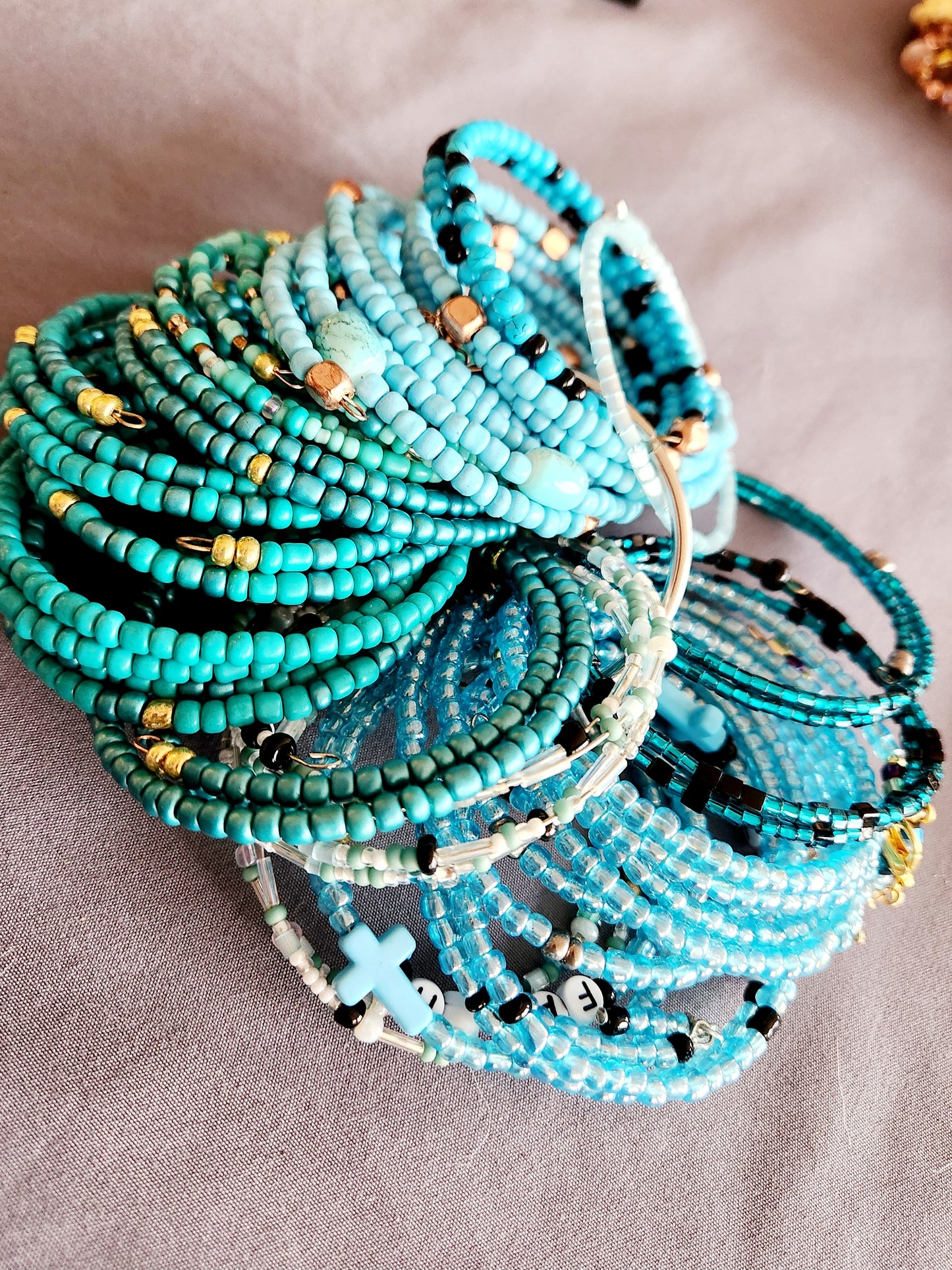 Bangle bracelet. Memory wire, beaded. Add-on charms available.
