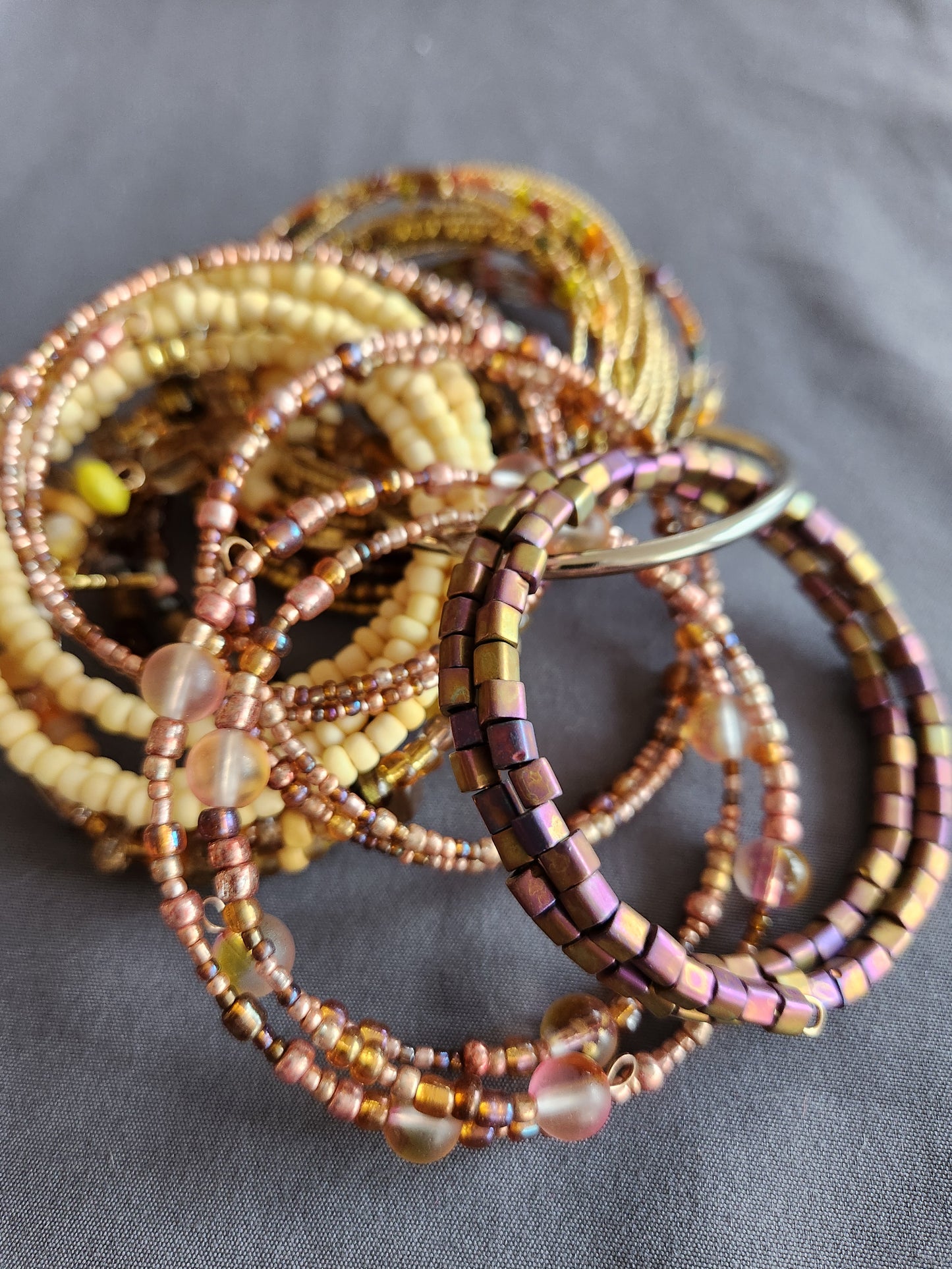 Bangle bracelet. Memory wire, beaded. Add-on charms available.